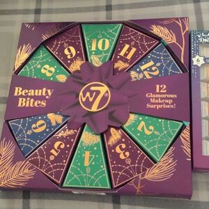 2 make up gift sets. One is a 6 pack of 2oz. Lipglosses, other is a 12 pack of